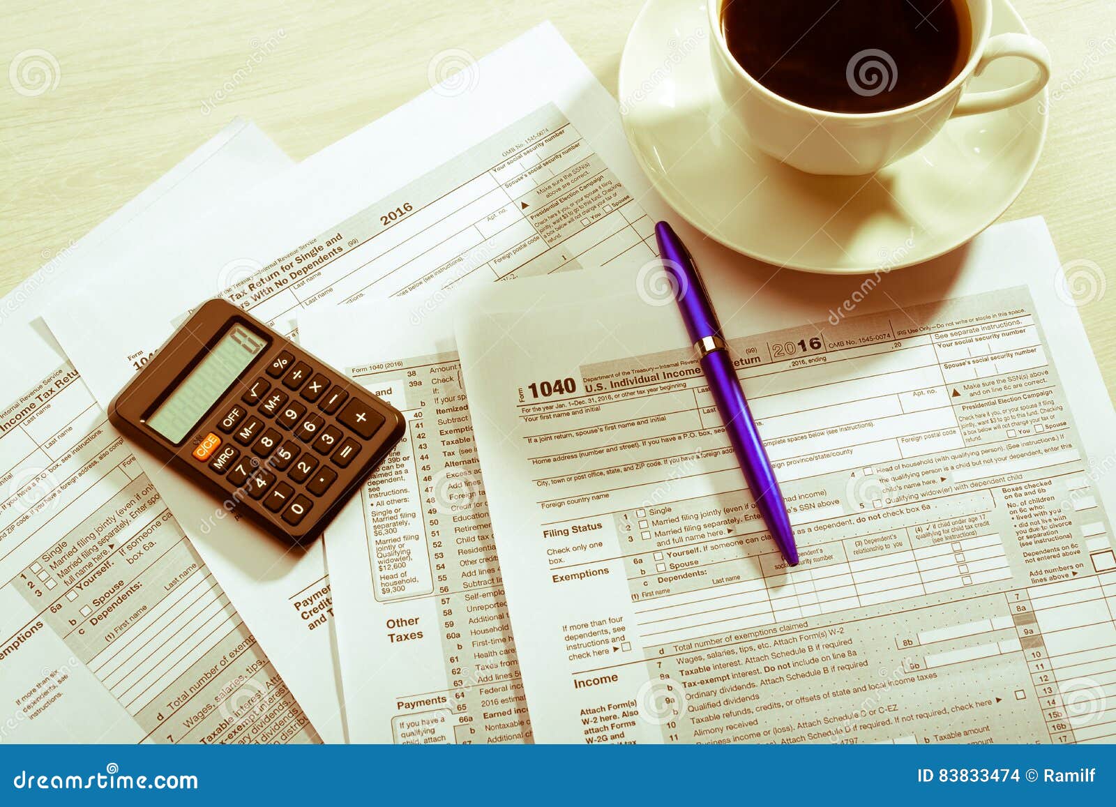 Cup of coffee and tax form editorial stock image. Image of finance