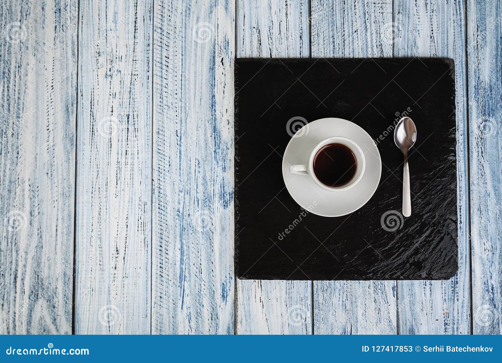 Cup of coffee and teaspoon stock image. Image of background 127417853