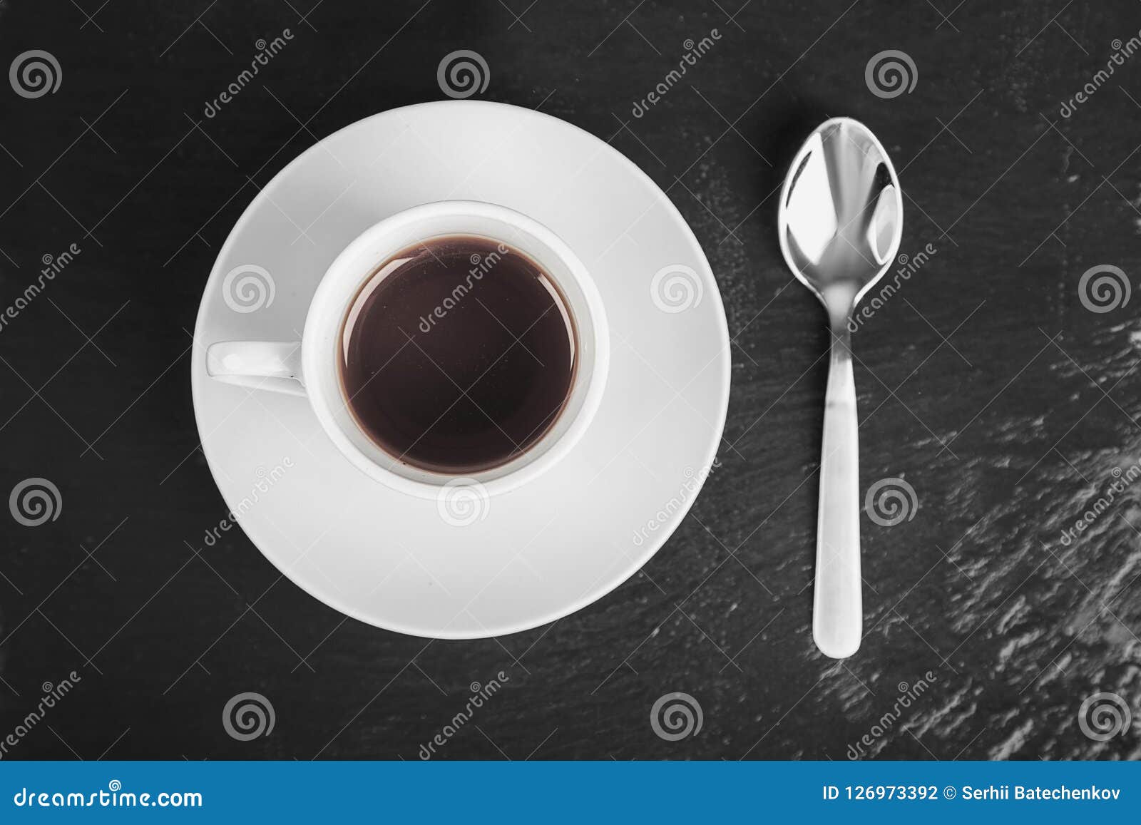 Cup of coffee and teaspoon stock photo. Image of brown 126973392