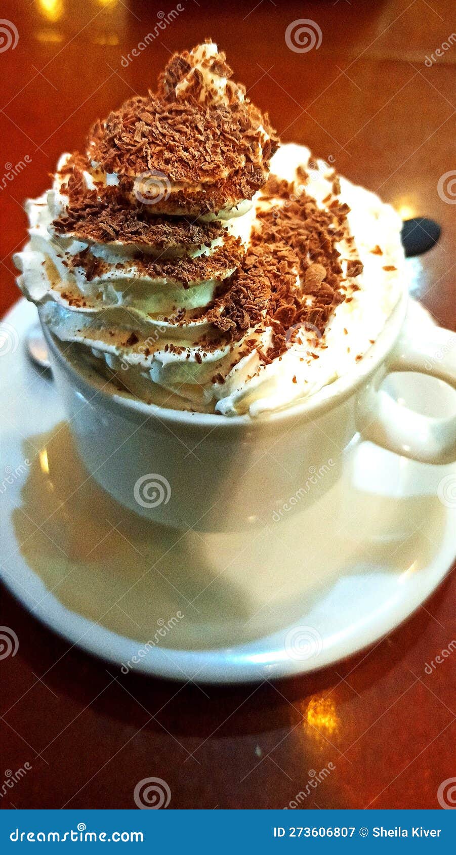 Cup of Coffee with Whipped Cream and Chocolate Shavings Stock Image