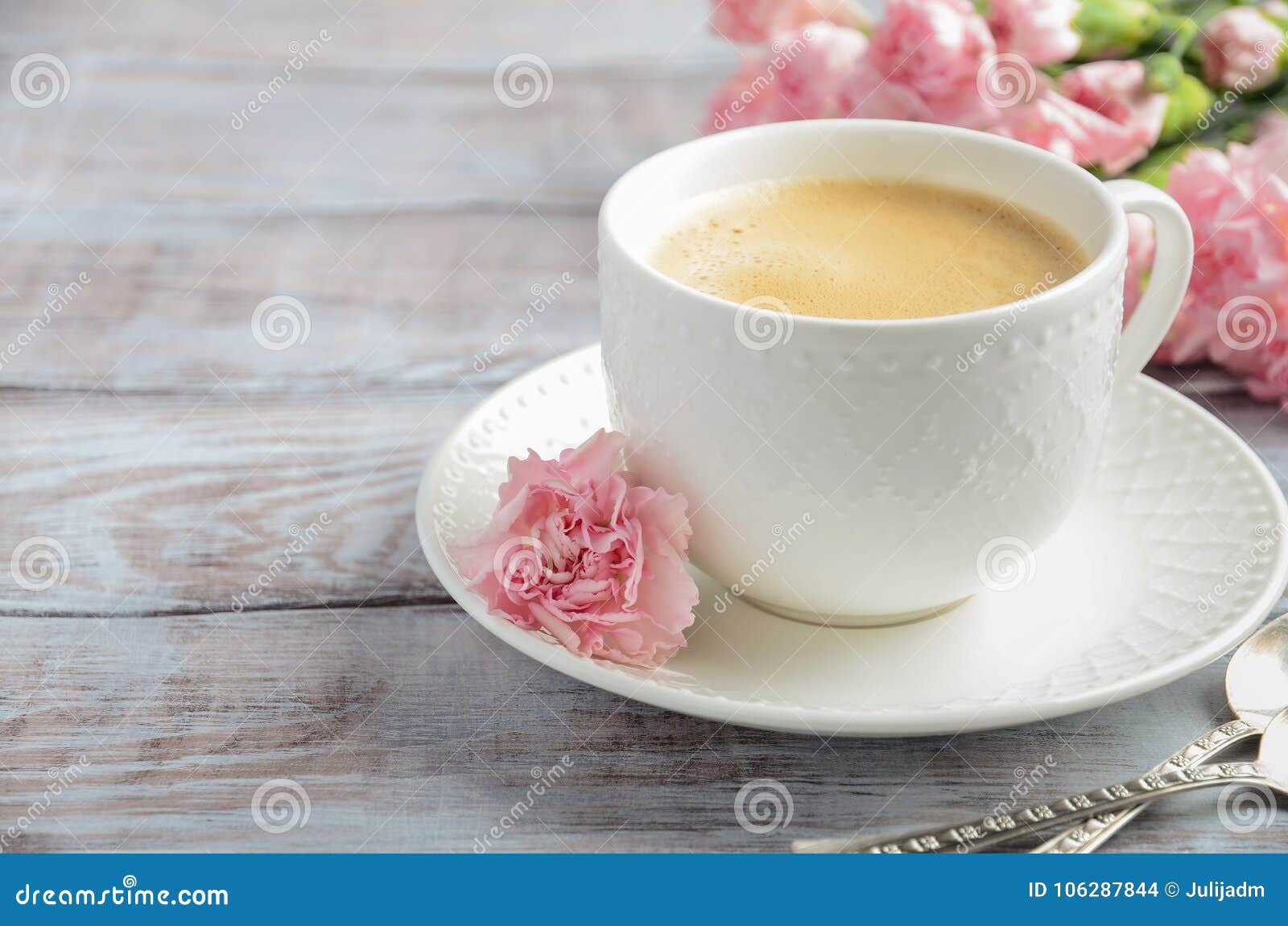 Cup of Fresh Morning Coffee with Pink Carnation Flowers on a ...