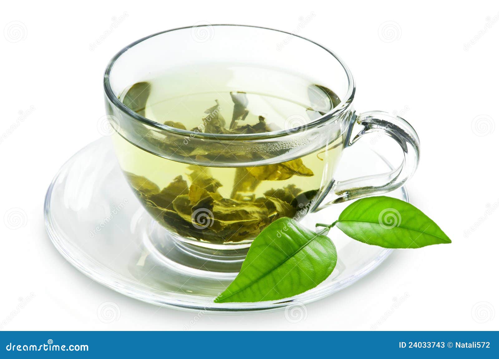 cup with green tea and green leaves.