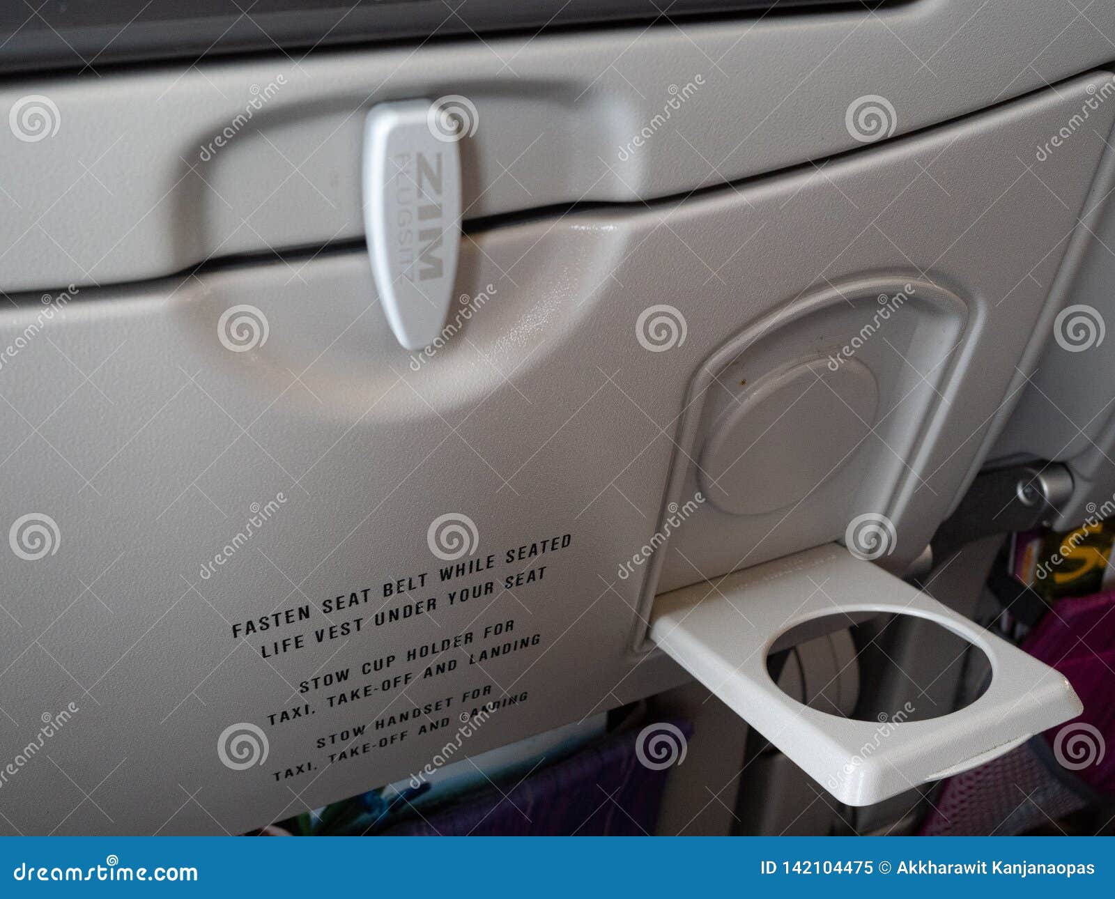 Cup Holder on Airplane Seat Stock Image - Image of drink, beverage:  142104475