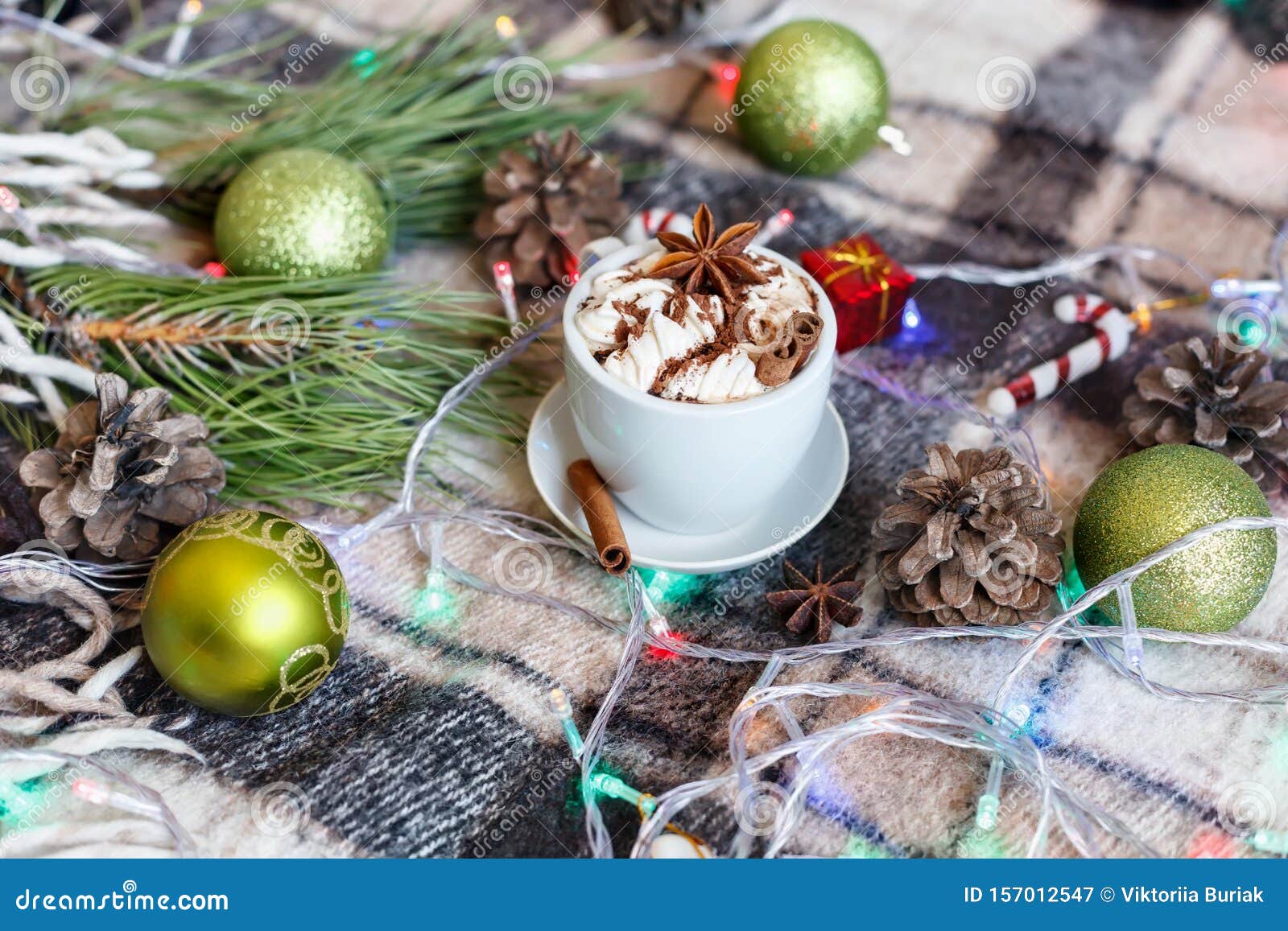 Cup of Hot Chocolate with Marshmallows. Christmas Lights Stock Image