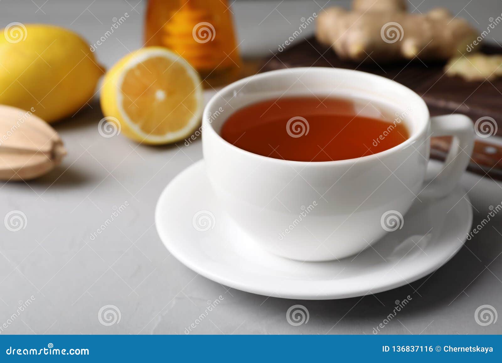 Cup of Hot Tea and Natural Cough Remedies on Table Stock Photo Image
