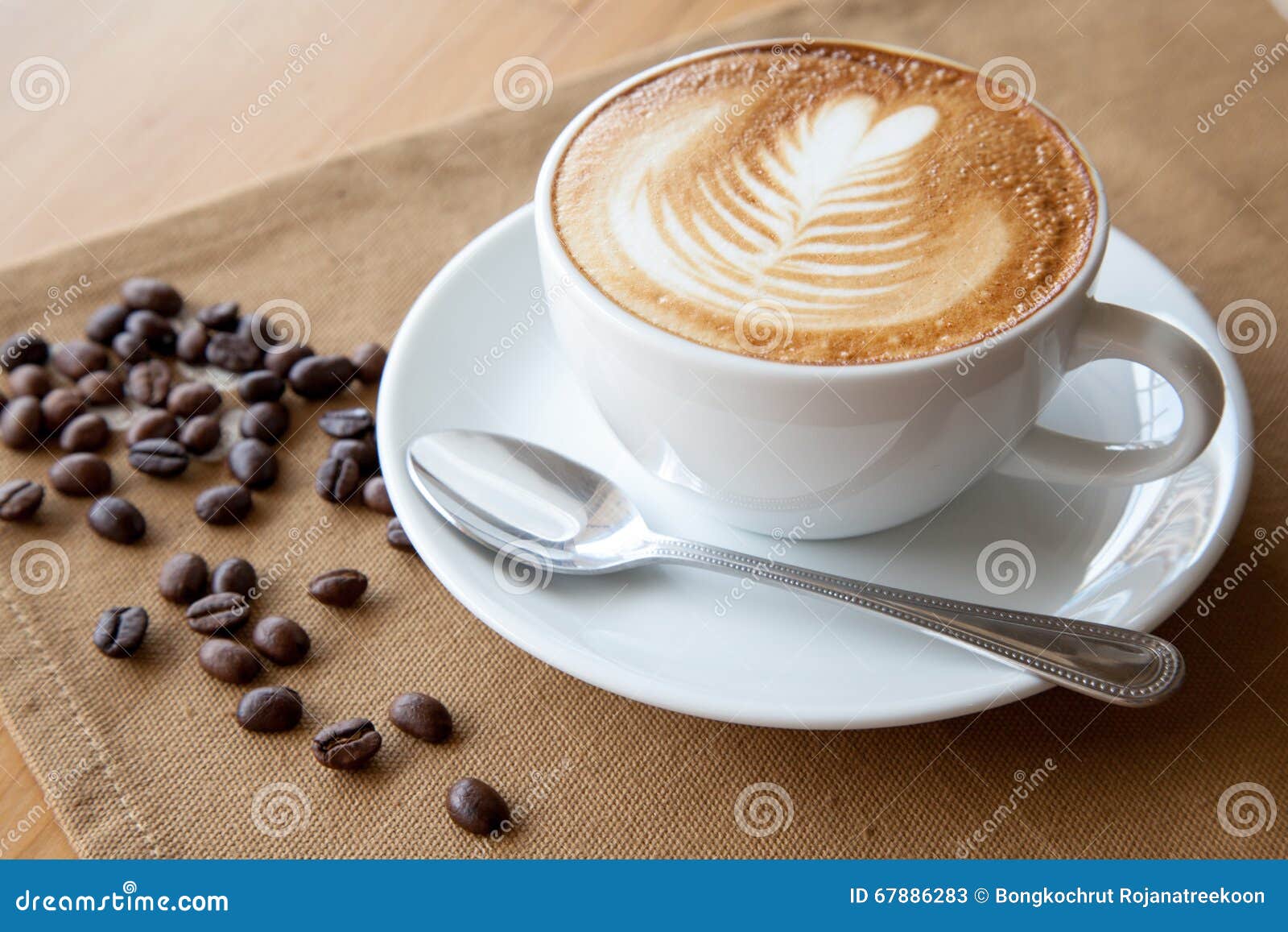A Cup of Latte Art and Coffee Beans Stock Image Image of pouring