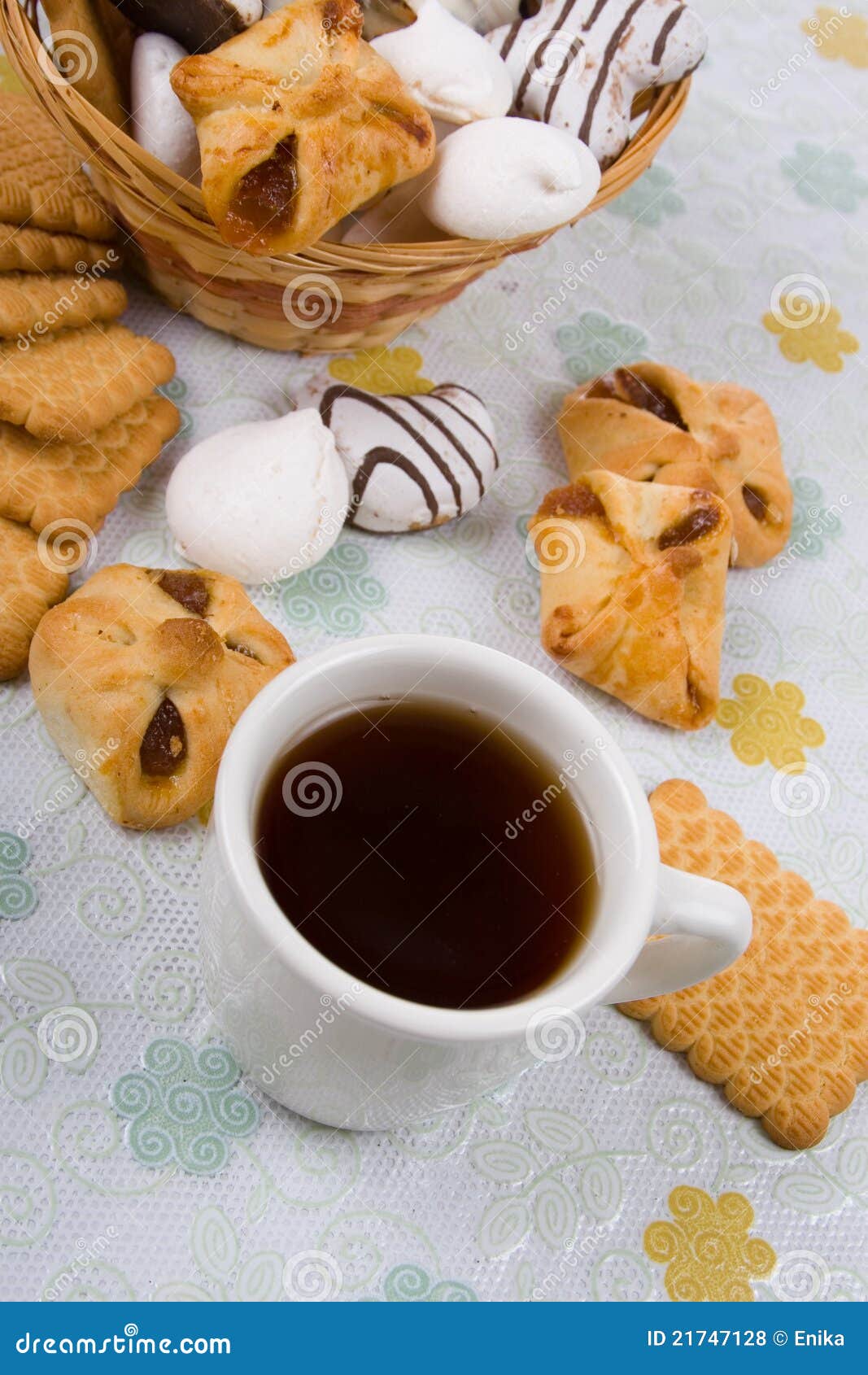 Cup of tea and biscuits stock photo. Image of mealtime 21747128