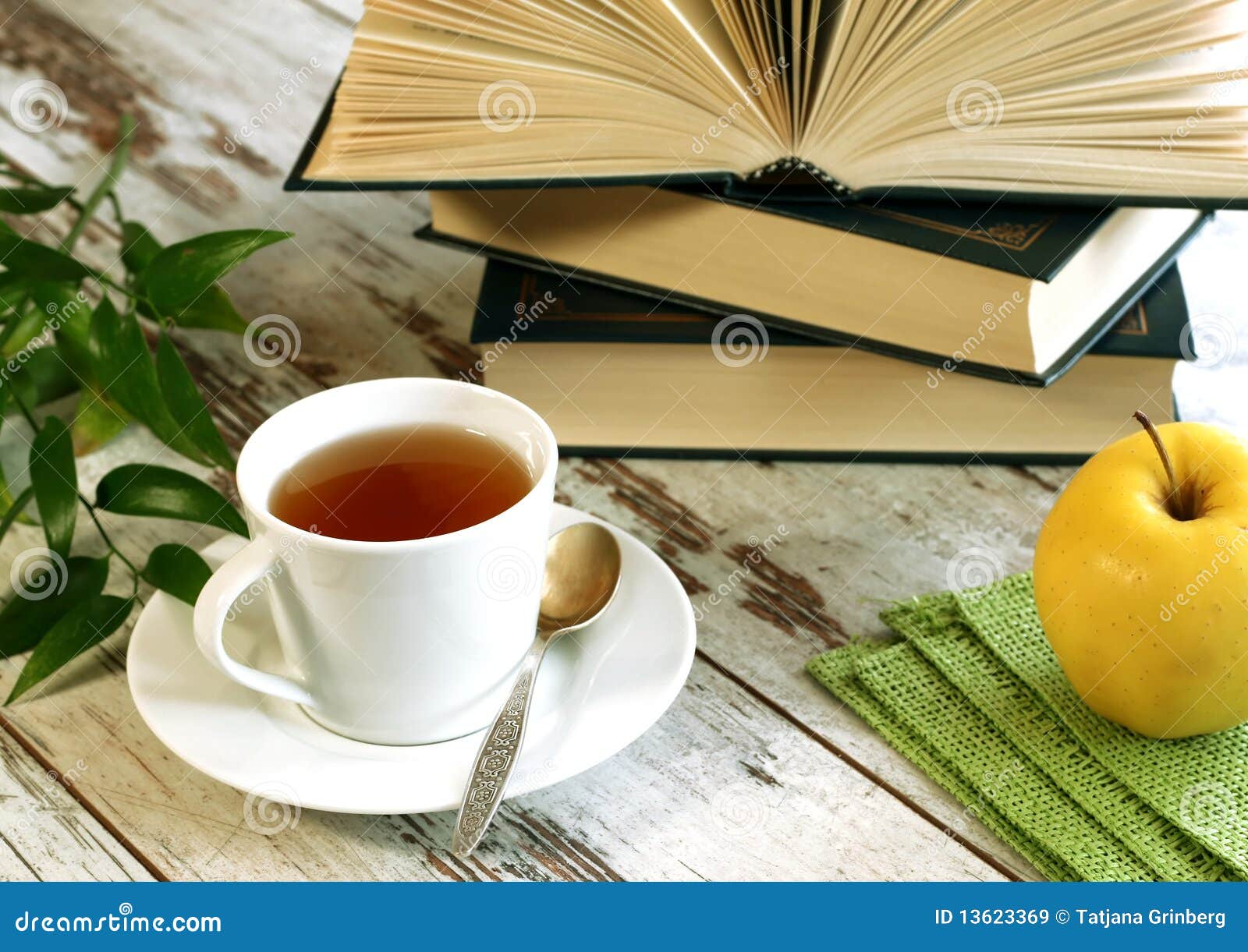 Cup of Tea, Books and Apple on Wooden Stock Image Image of table