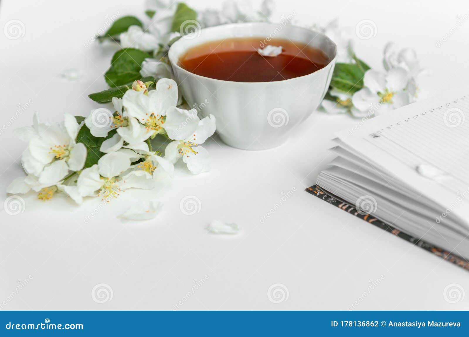 A Cup of Tea and a Diary on the Table. Stock Photo Image of leaf