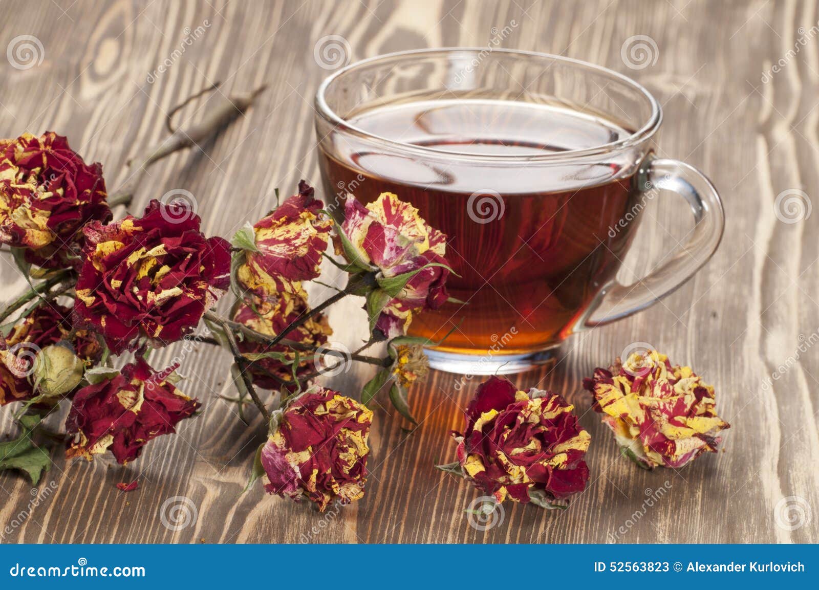 Cup of tea and dry roses stock image. Image of decorative 52563823