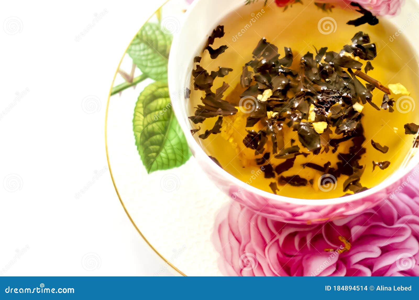 Cup of Tea. Large Tea Leaves in a Cup. a Can of Tea. Largeleaf Tea