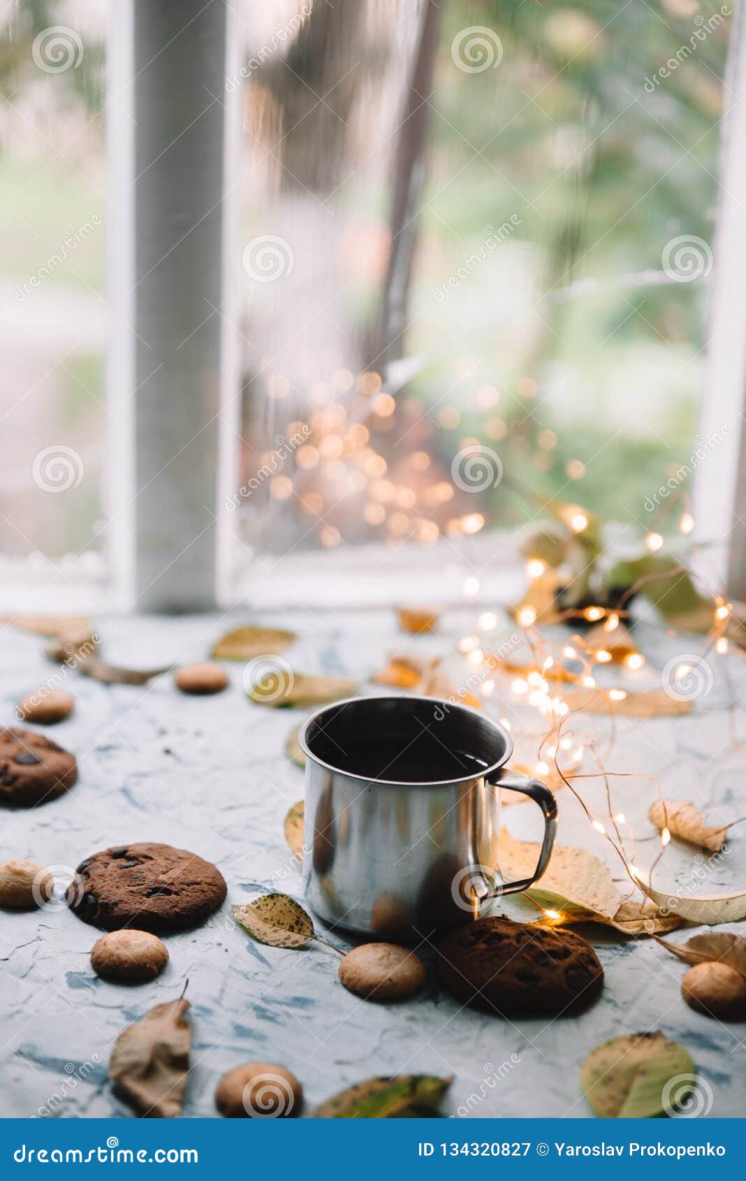 Cup with Tea Near the Window with Autumn Leaves and Cookies Stock Image ...