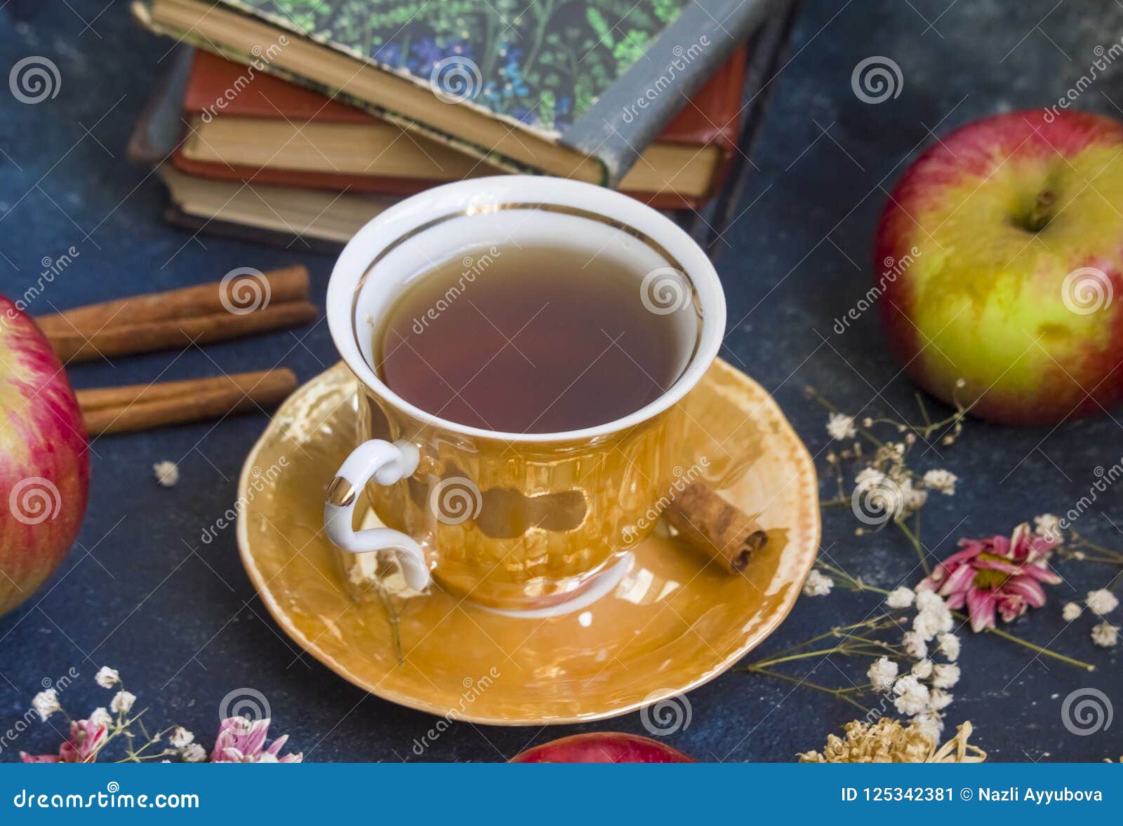 A Cup of Tea with Red Apples and Cinnamon Stock Image Image of fresh