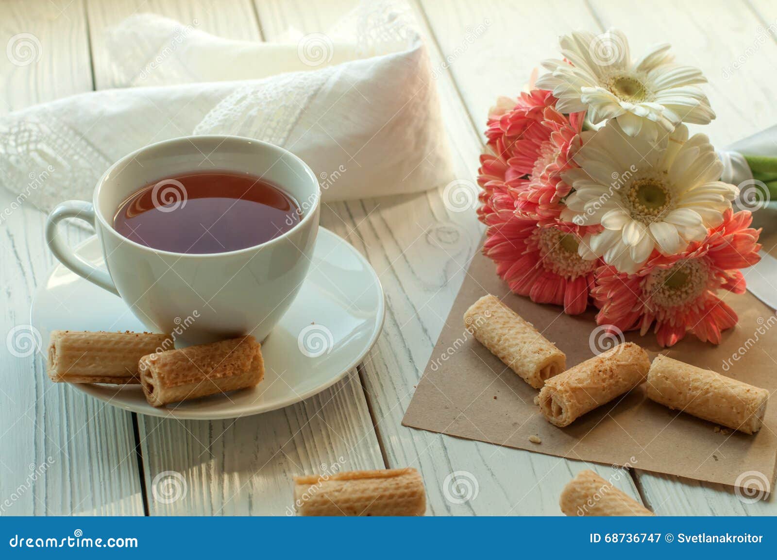 A Cup of Tea, Several Biscuits, a Lace Napkin and a Bouquet of Spring