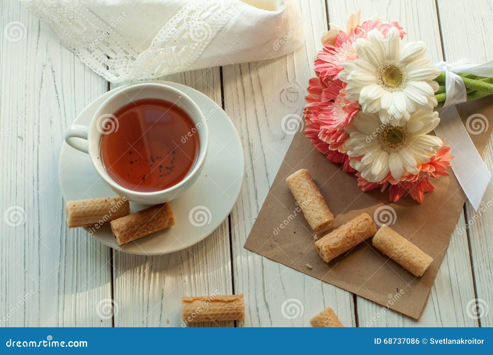 A Cup of Tea, Several Biscuits, a Lace Napkin and a Bouquet of Spring