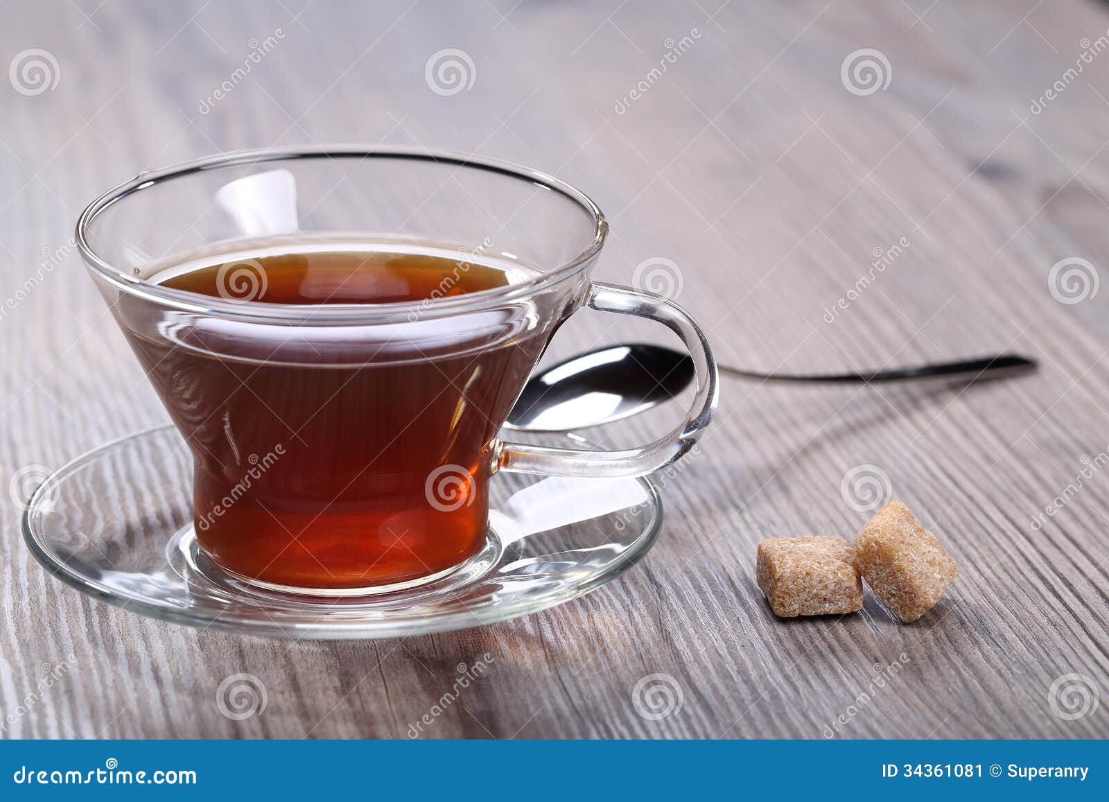 Cup with tea and sugar stock image. Image of black, teacup 34361081
