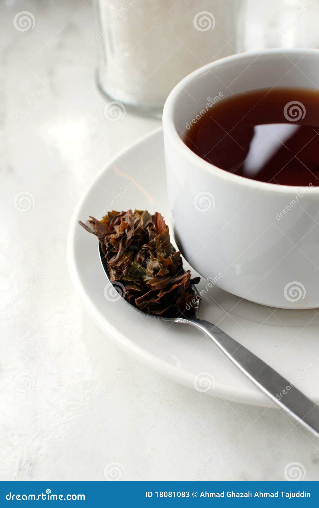 A Cup of Tea Wit a Spoon Full of Tea Leaves. Stock Image Image of closeup, aromatic 18081083