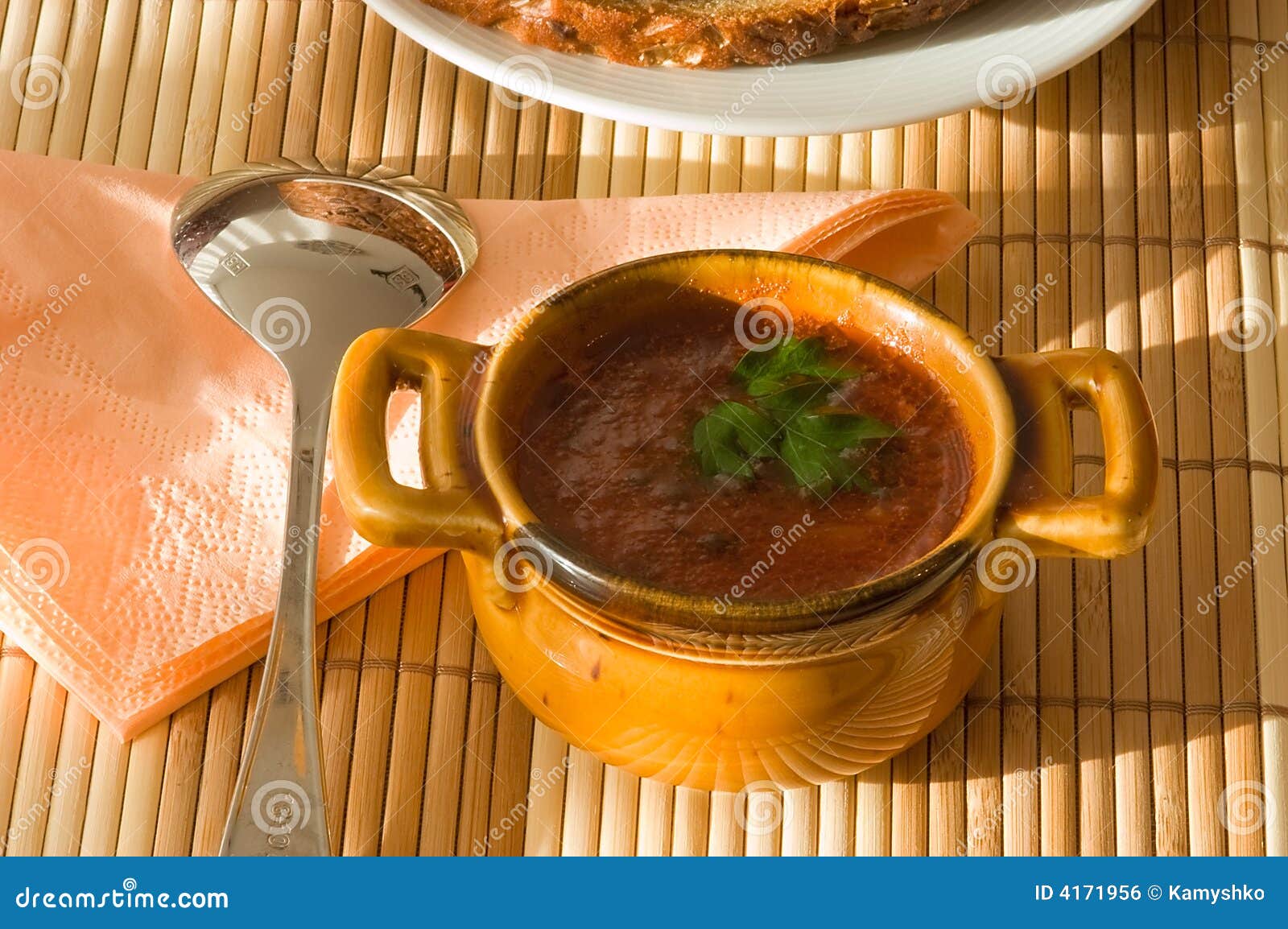 Cup of Tomato Soup on Bamboo Serviette. Stock Photo Image of detail