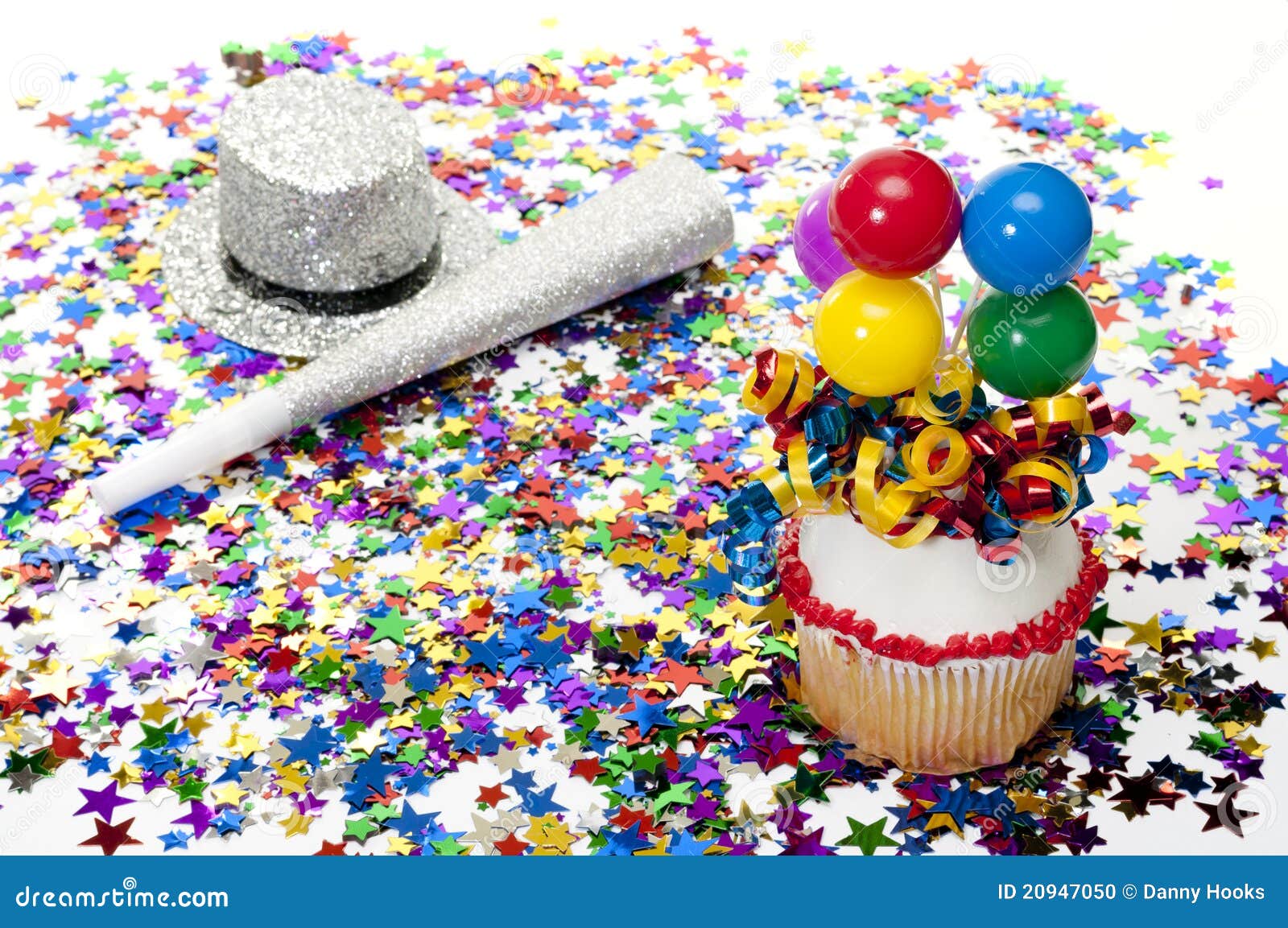 Cupcake, Confetti, Horn, and Hat at Party Stock Photo Image of