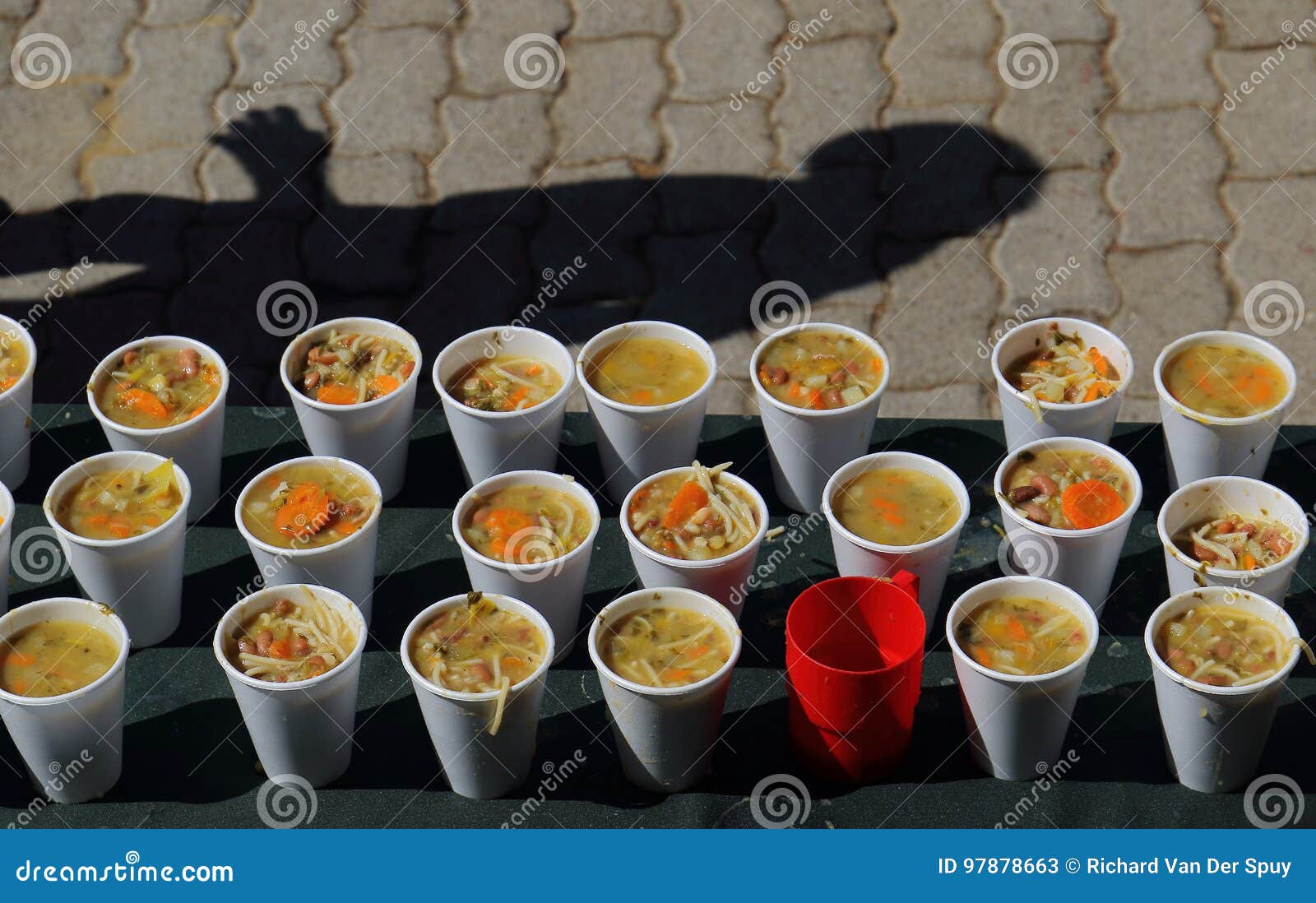 Cups of Soup at a Soup Kitchen for the Poor Stock Image - Image of