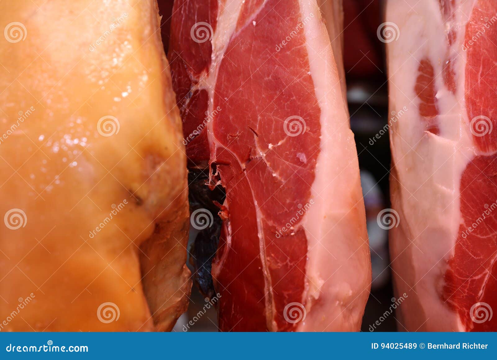 cured ham jamon iberico on market in madrid
