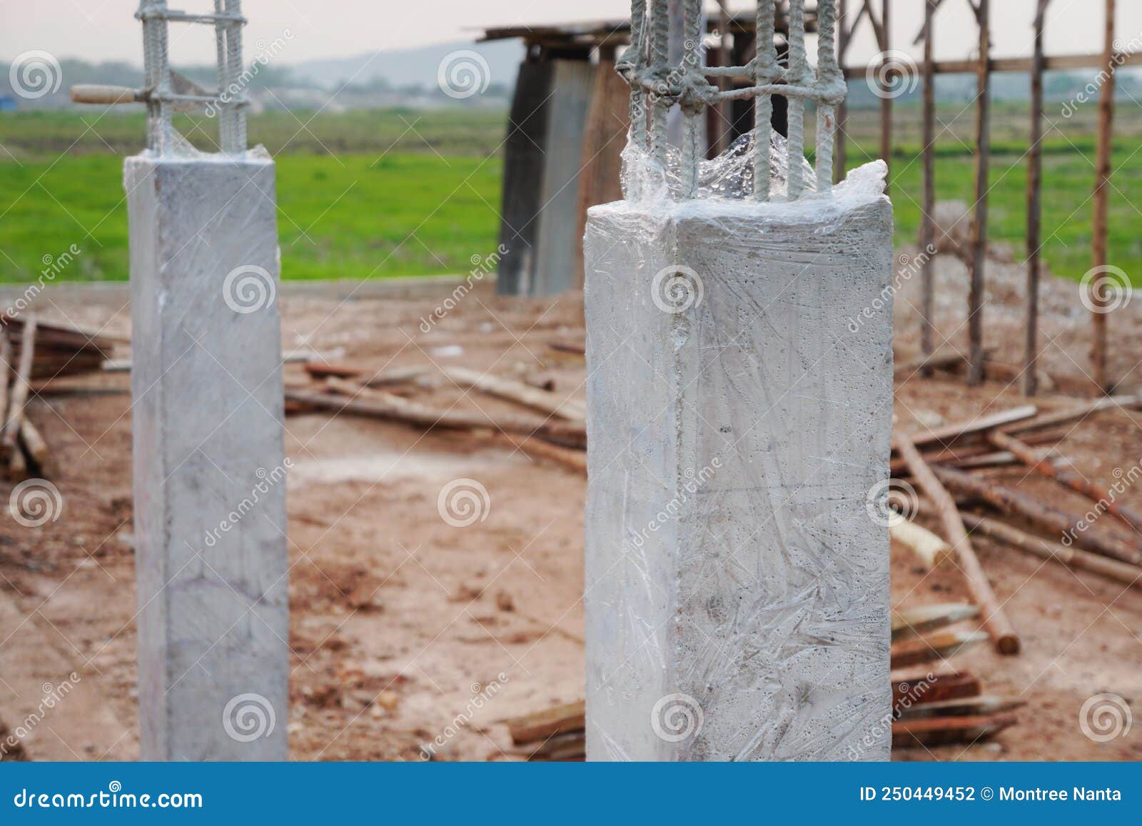 Clear Plastic Covers Concrete Columns To Prevent Water Loss in Concrete