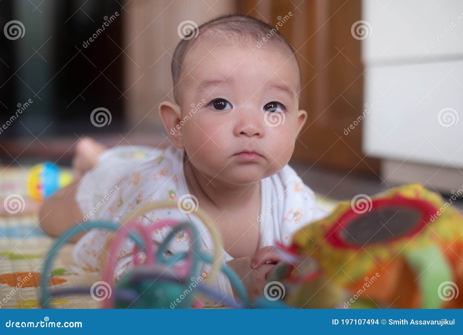 Curious Asian Infant Baby Boy Lie on the Stomach or Prone Playing Toy ...