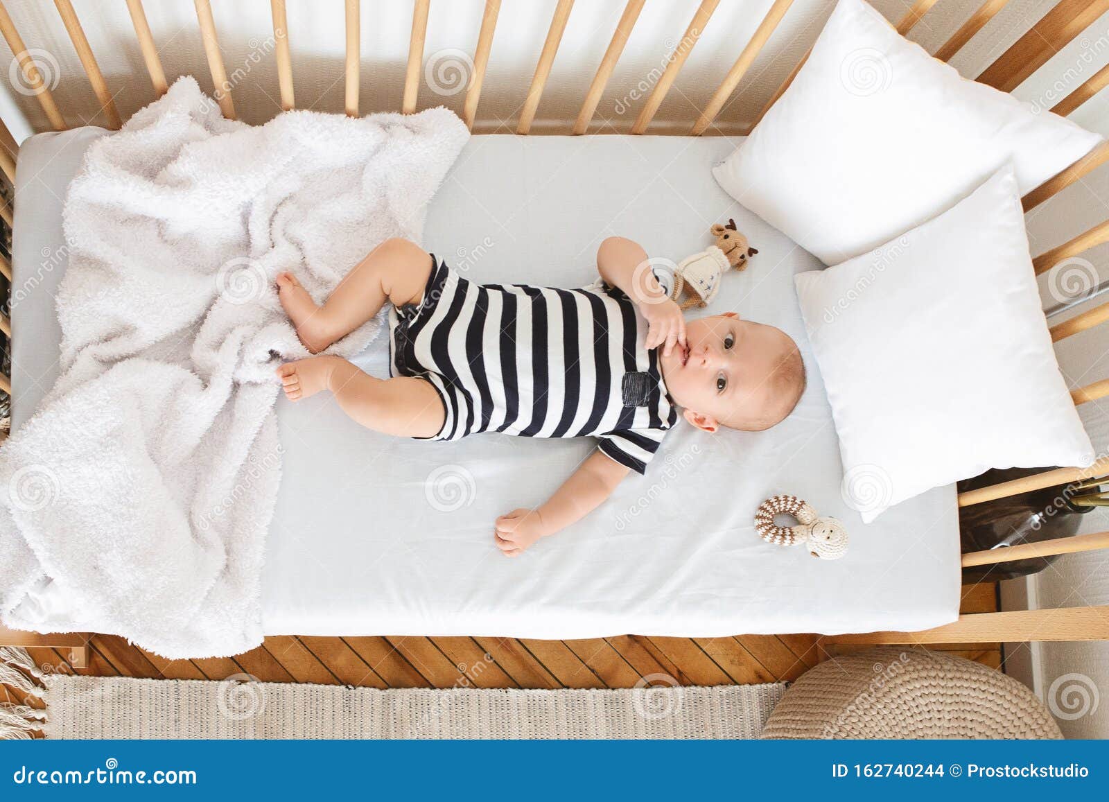 Cute Baby With Finger In His Mouth Stock Image - Image of 