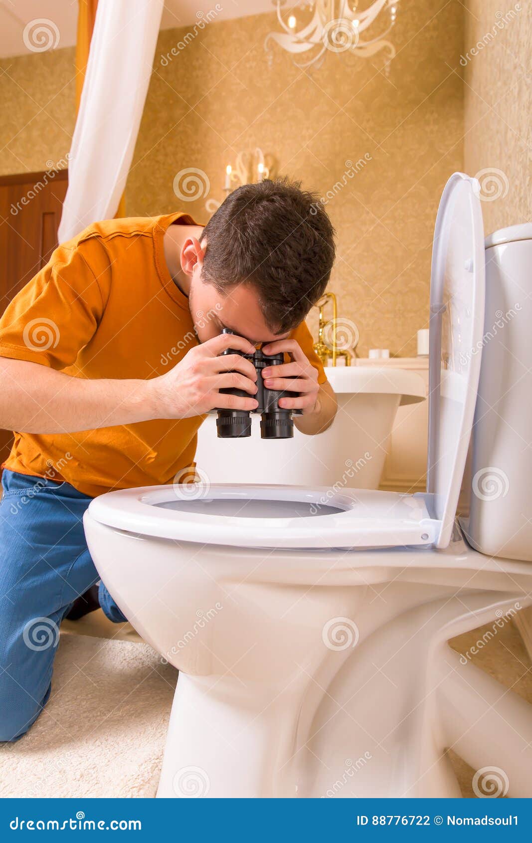 Curious Man with Binoculars Looking in the Toilet Stock Photo Image