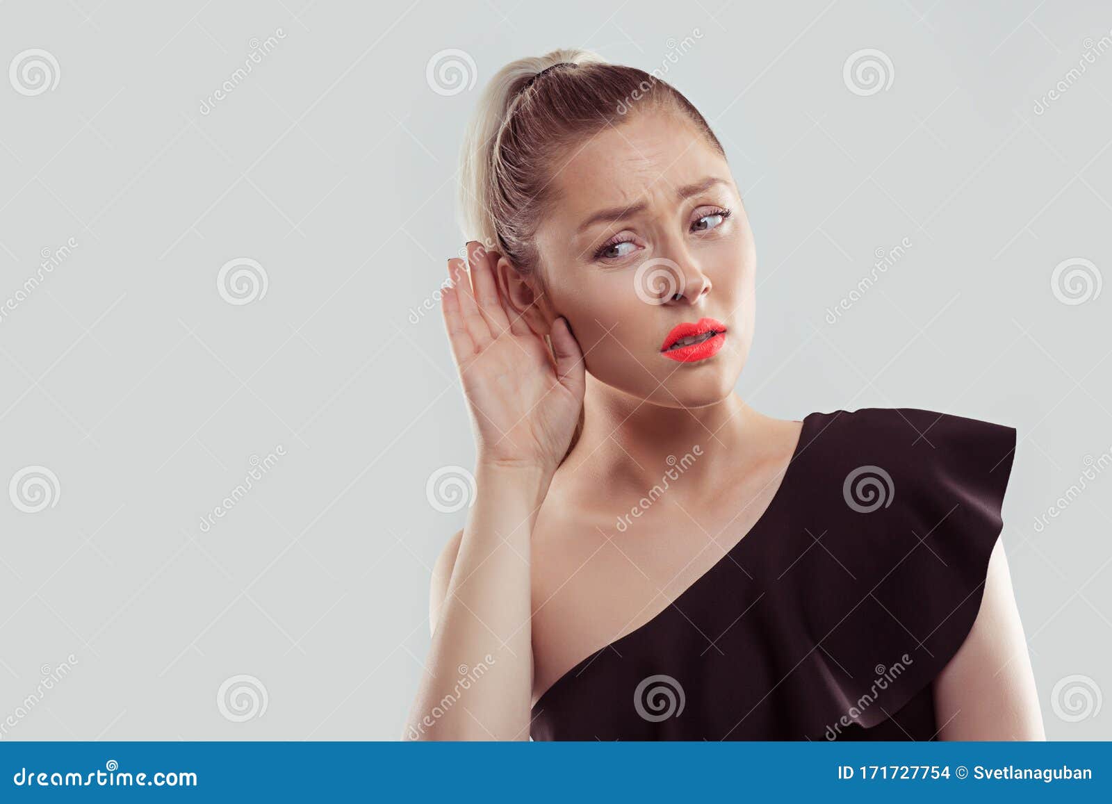 Curious Worried Woman With Hand To Ear Carefully Secretly Listening To