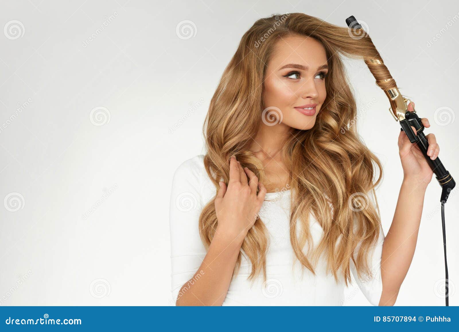 Curly Hair. Beautiful Woman Curling Long Wavy Hair with Iron Stock Photo -  Image of curling, curls: 85707894