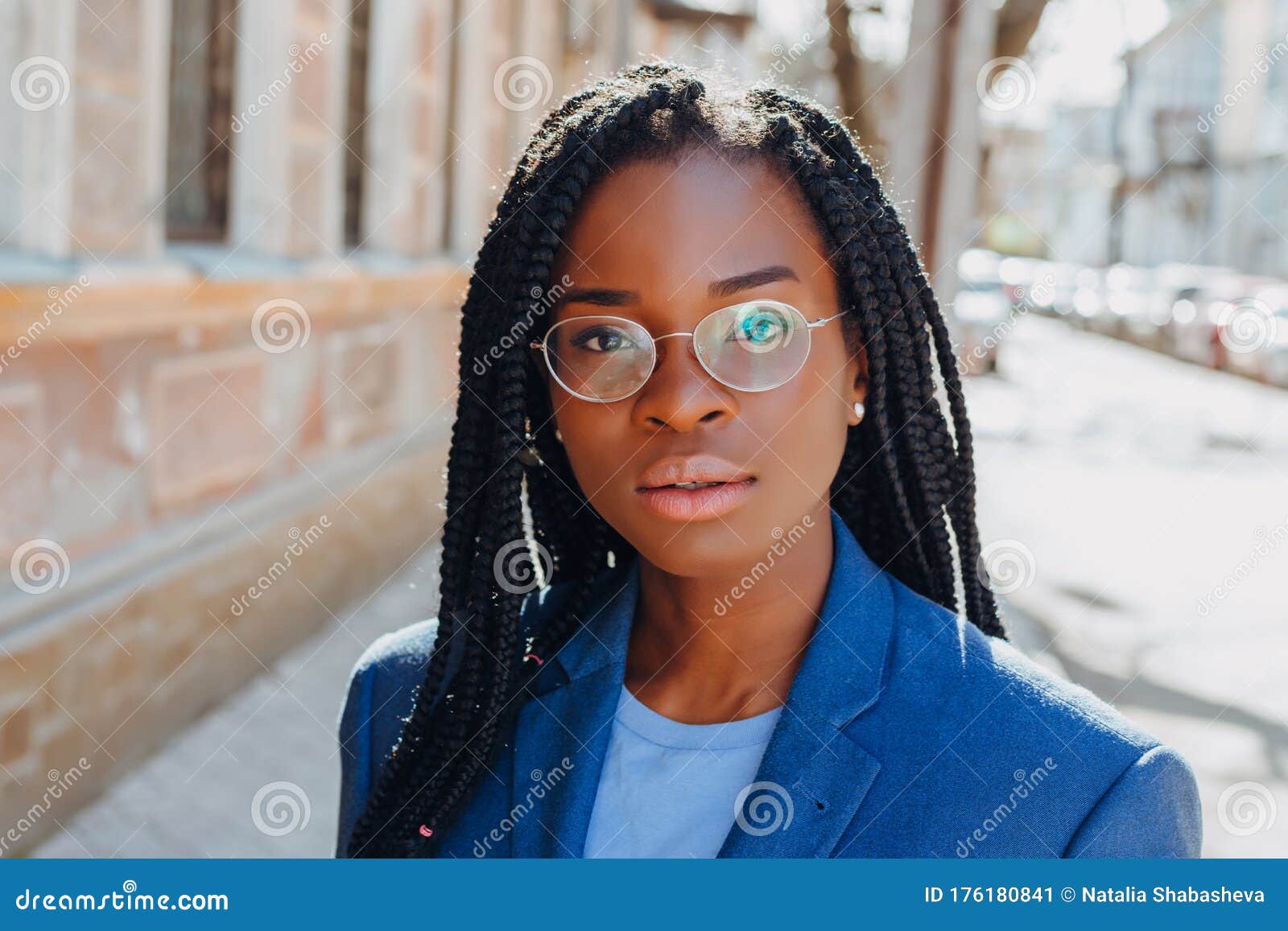 Close Up Portrait of a Beautiful Young African American Woman with Pigtail Hairstyle in a Blue Jacket and Glasses Smiling and Stock Image - Image of blue, black: 176180841 Close Up Portrait of a Beautiful Young African American Woman with Pigtail Hairstyle in a Blue Jacket and Glasses Smiling and Stock Image - Image of blue, black: 176180841