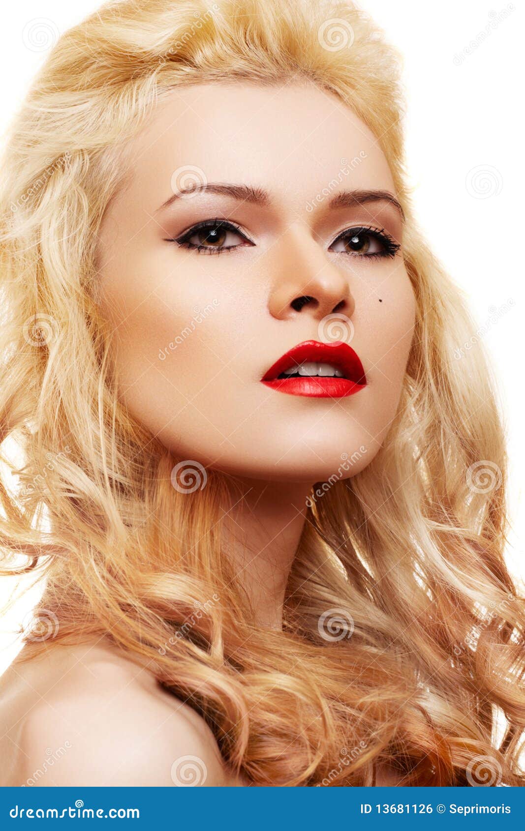 Curly Hairstyle. Blonde With Shiny Hair, Make-up Stock 