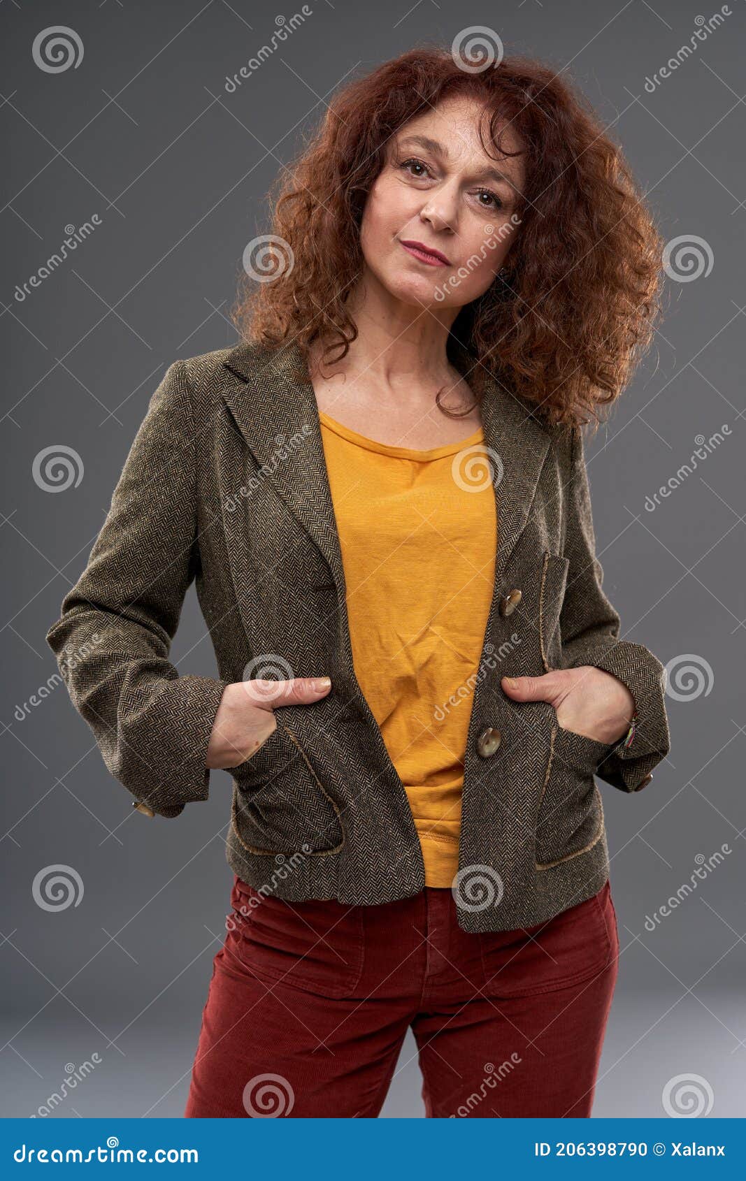 Curly redhead mature woman stock photo. Image of experienced - 206398790