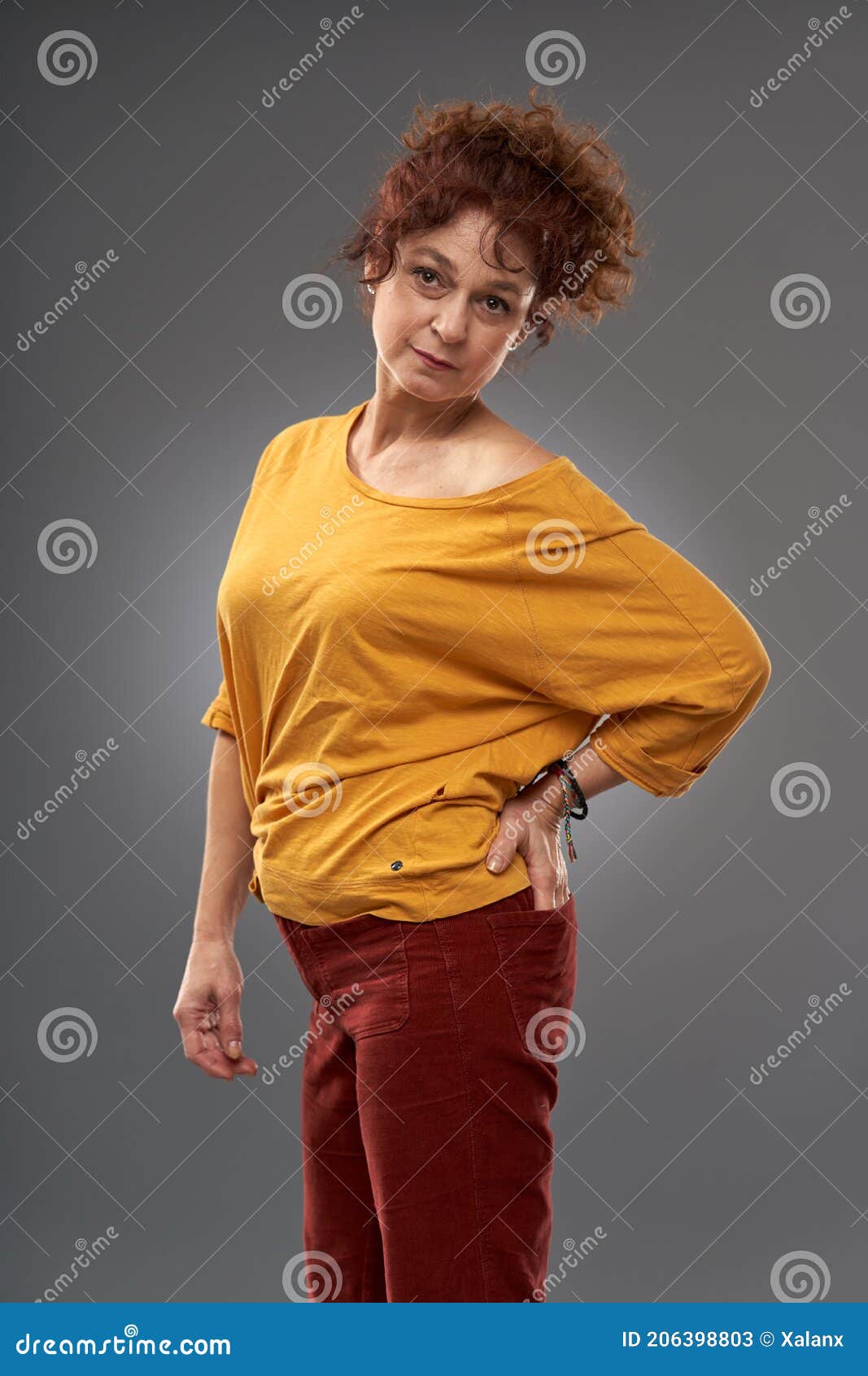 Curly redhead mature woman stock image. Image of single - 206398803