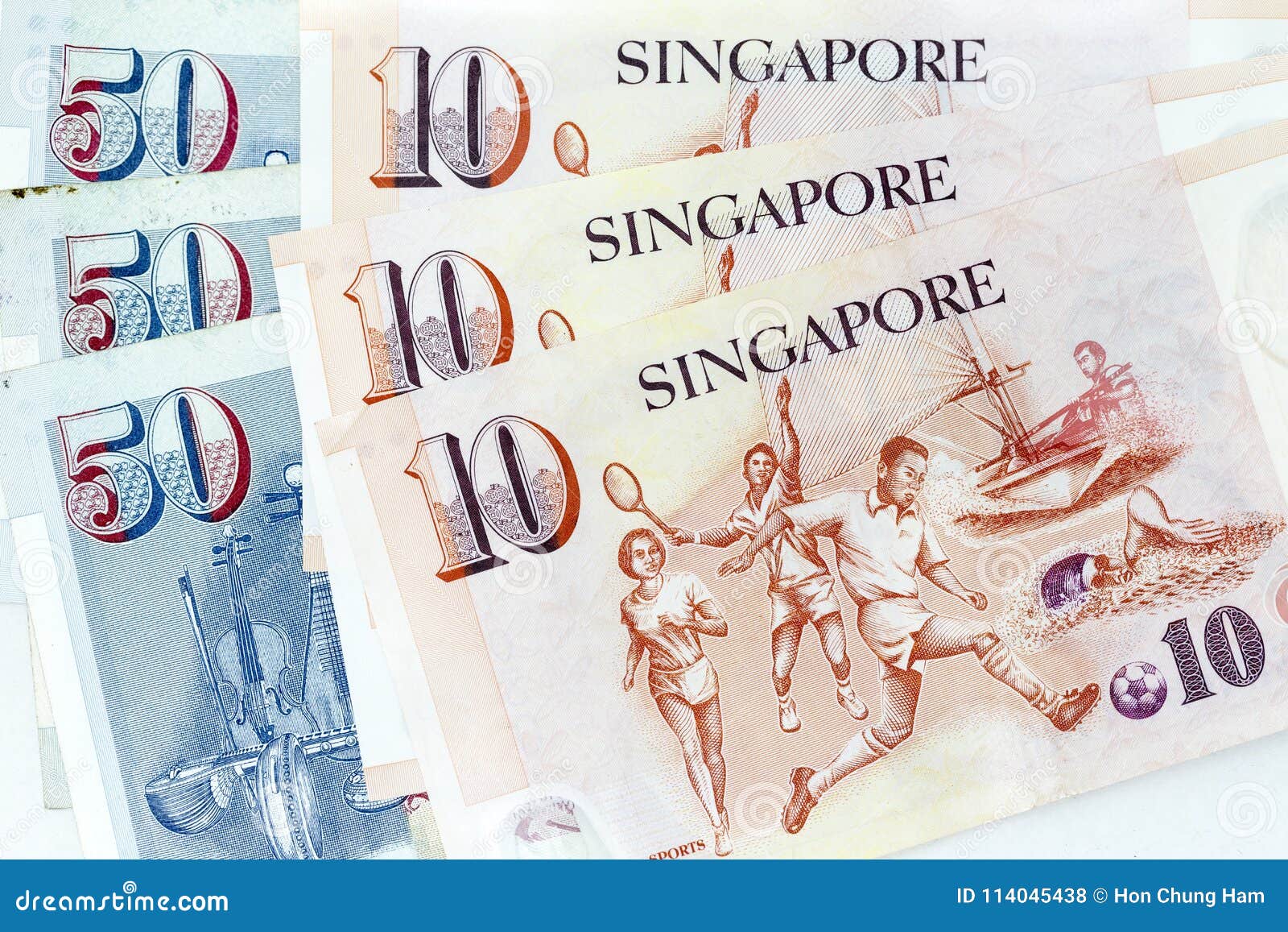 Currency Banknotes Spread Across Frame Singapore Dollar in Various