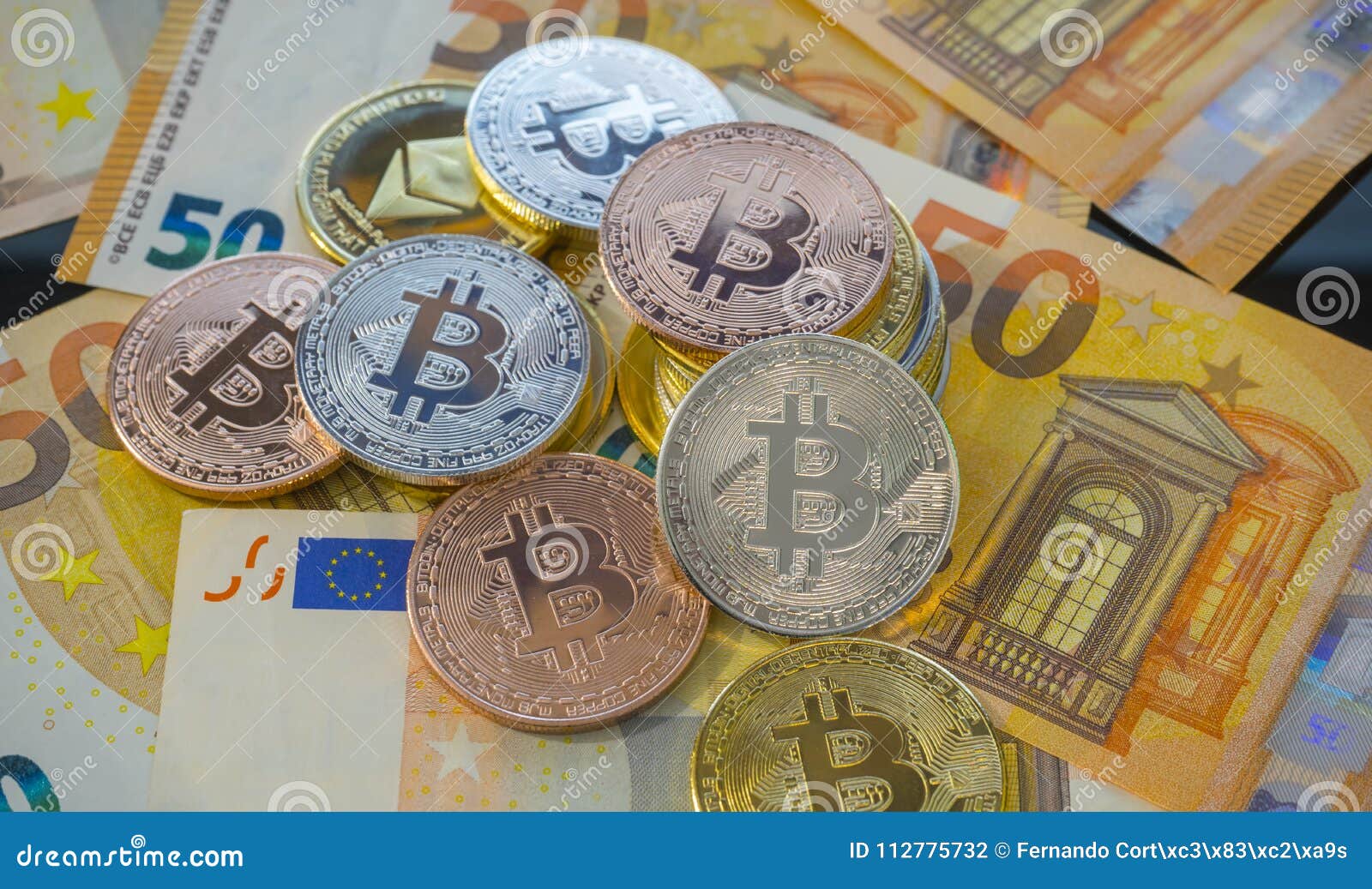 Currency Bitcoin BTC Coins On Bills Of Euro Banknotes ...