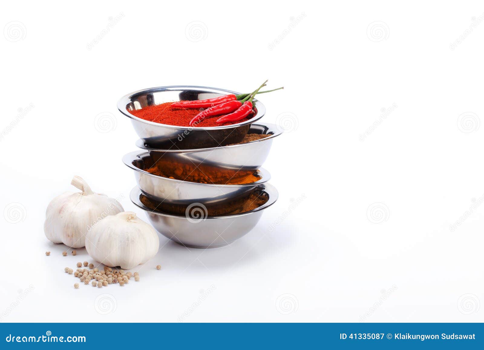 Curry Powder in Bowl Stack with Chili ,garlic,pepper Ingredients Stock