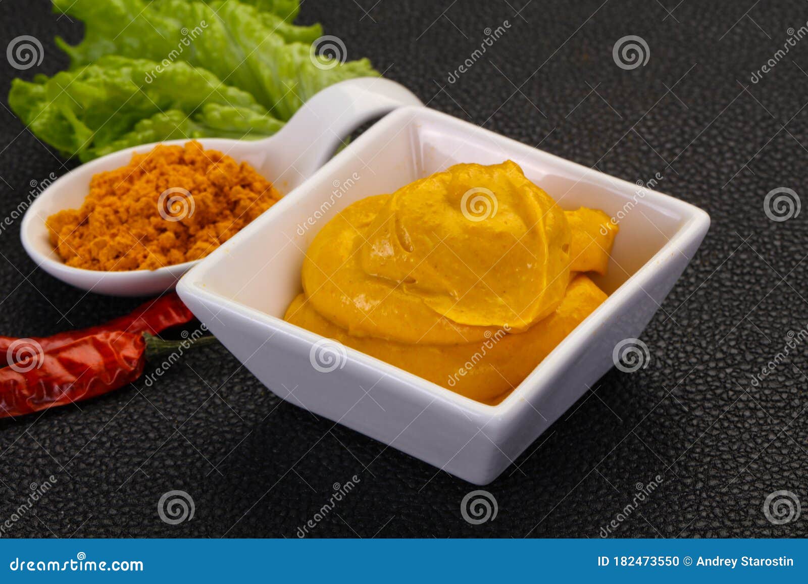 Curry sauce in the bowl stock photo. Image of closeup 182473550