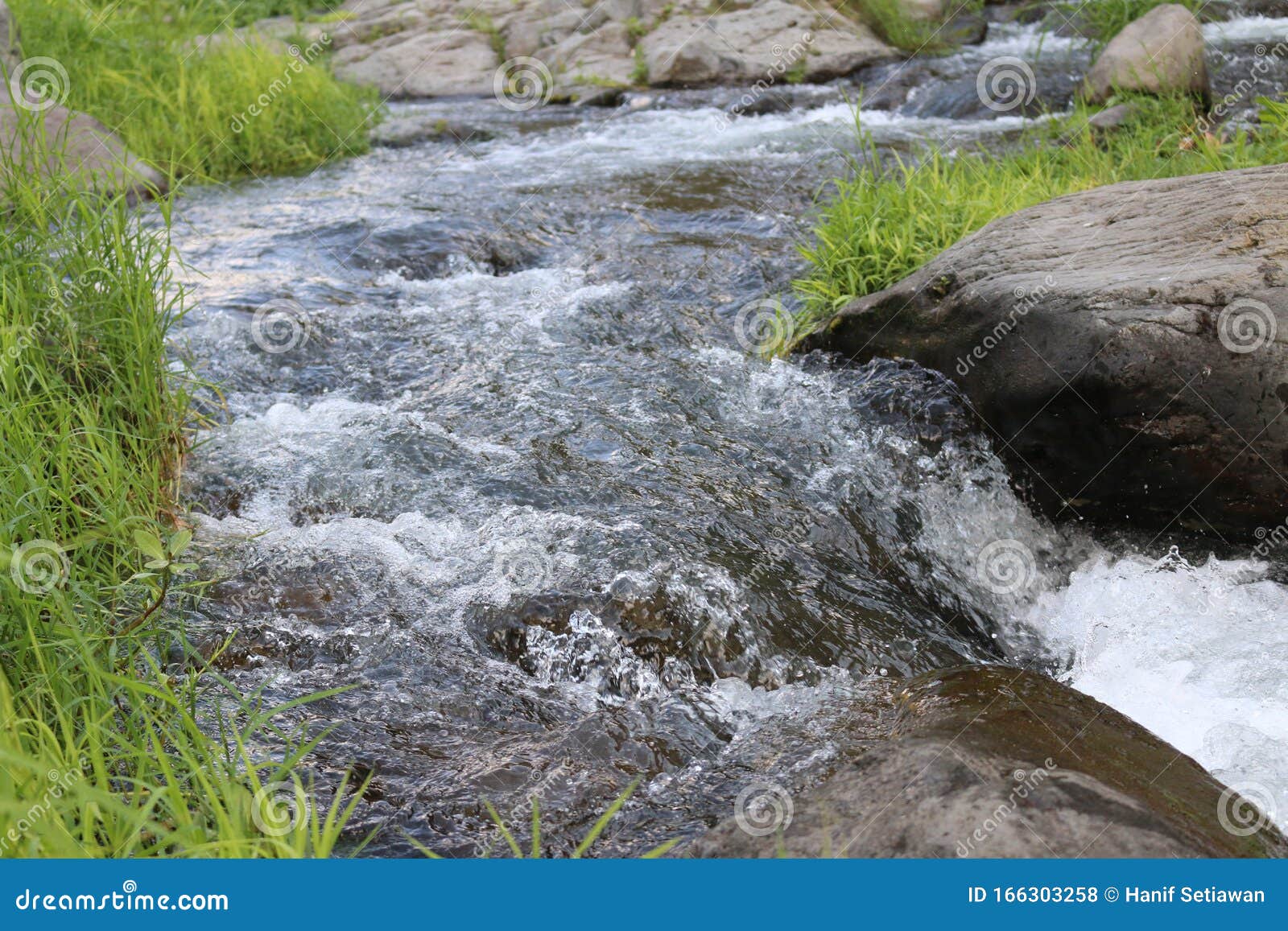 curved tearing creek at river fall kedung kayang, magelang, java, indonesia