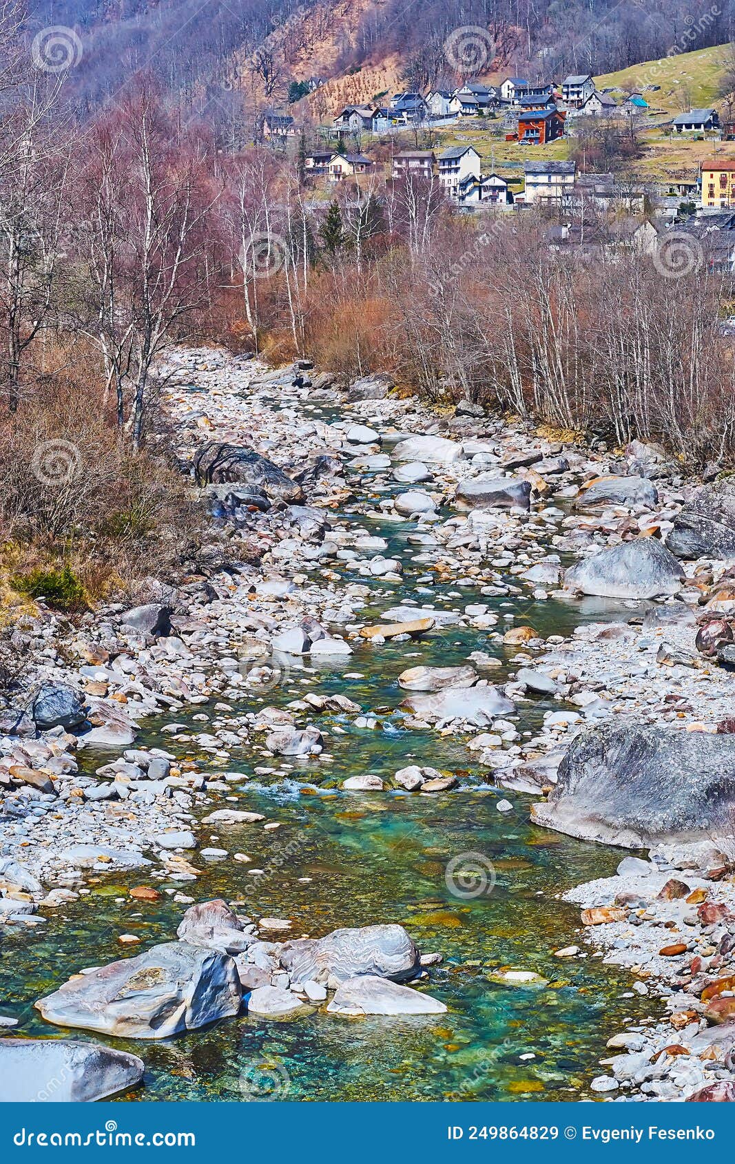 the curved verzasca river amid the rocks, frasco, valle verzasca, switzerland