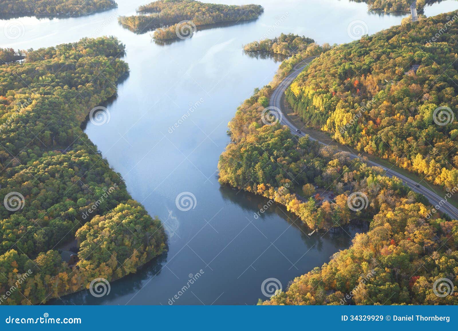 curving road along mississippi river during autumn
