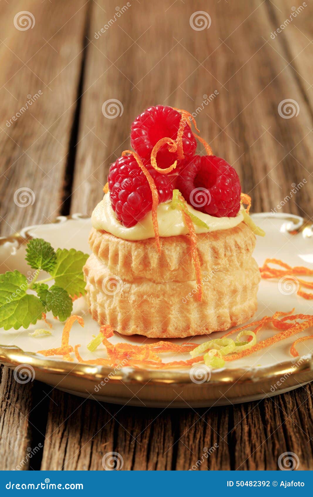 Custard Filled Puff Pastry Shell with Raspberries Stock Photo Image
