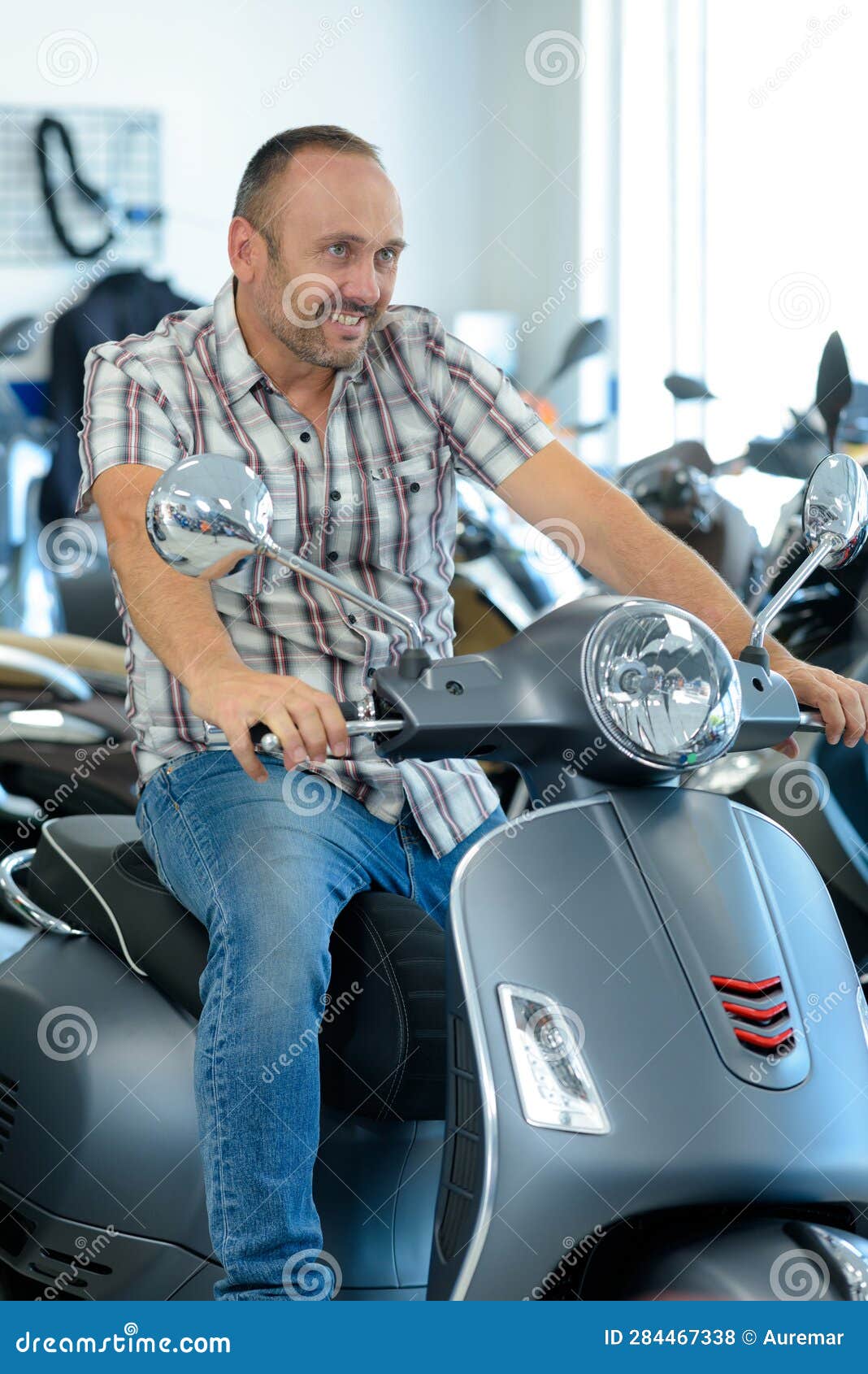 Customer choosing scooter stock photo. Image of buyinh 284467338