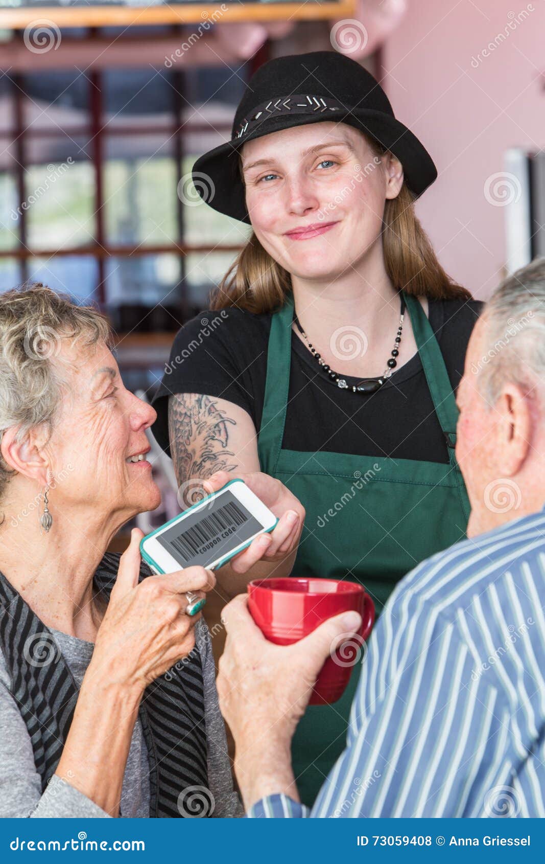 Customer Giving Waitress Coupon on Smart Phone Stock Photo Image of
