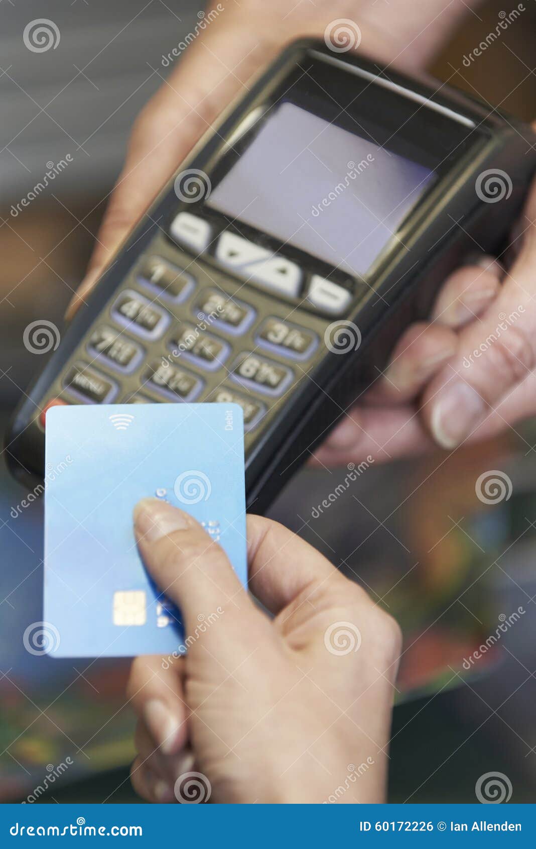 customer making purchase using contactless payment