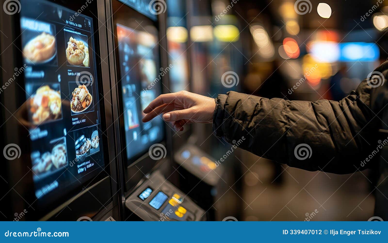 customer using modern touchscreen kiosk for self-service ordering at fast food restaurant.