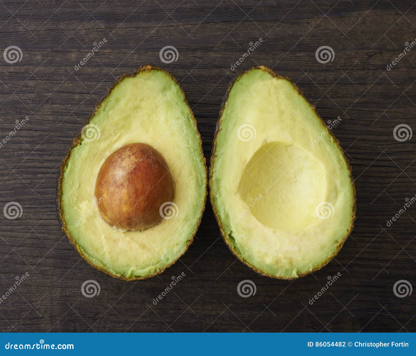 cut avocado halves with seed