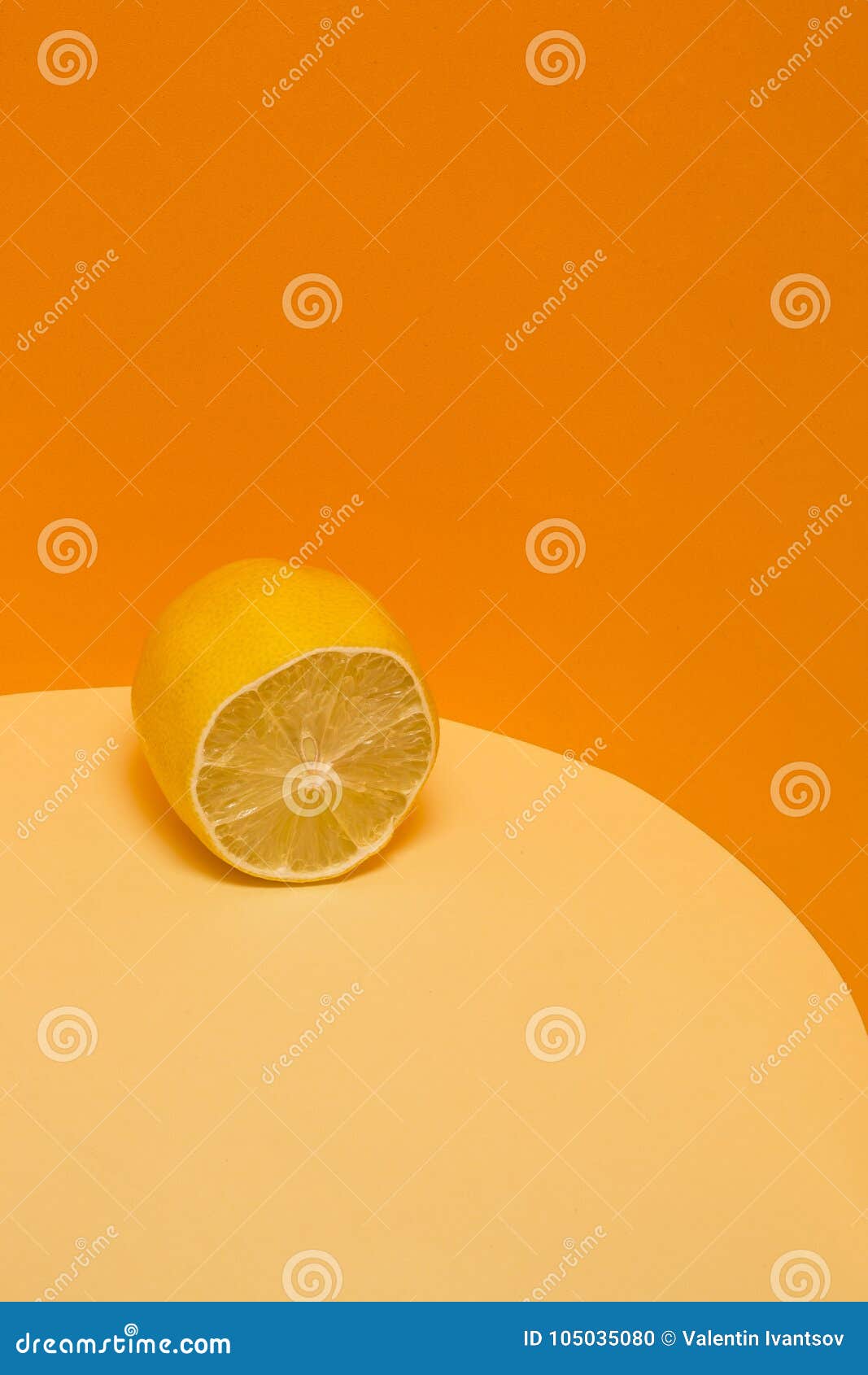 Cut Fresh Lemon on a Yelloworange Background. Stock Photo Image of
