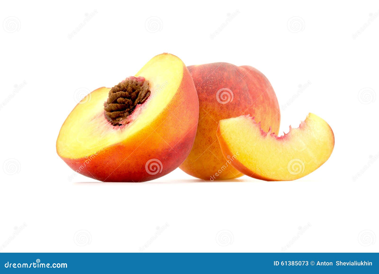 Cut In Half With A Slice Of Peach Closeup Isolated On White Stock